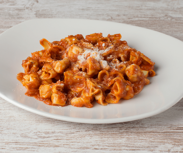 Pasta con saquito de queso