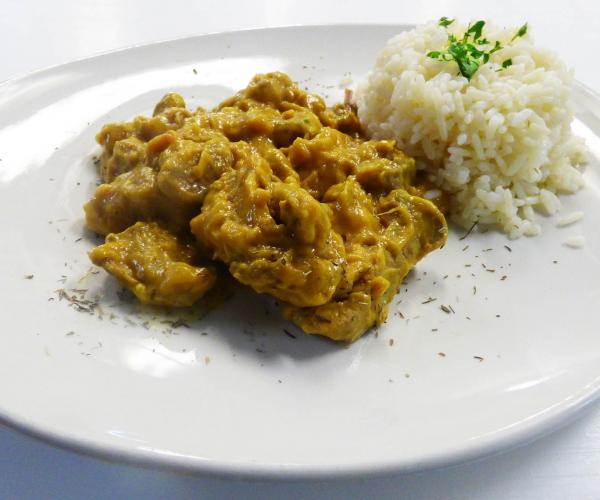 Pavo con salsa oriental y Arroz